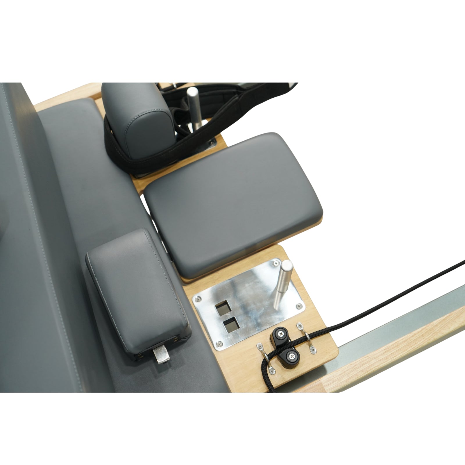 Top down view of Grove oak reformer carriage and headrest, high-density padding for maximum comfort.