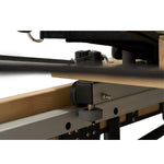 Under-carriage roller mechanism of Nestor maple reformer, engineered for frictionless gliding performance.