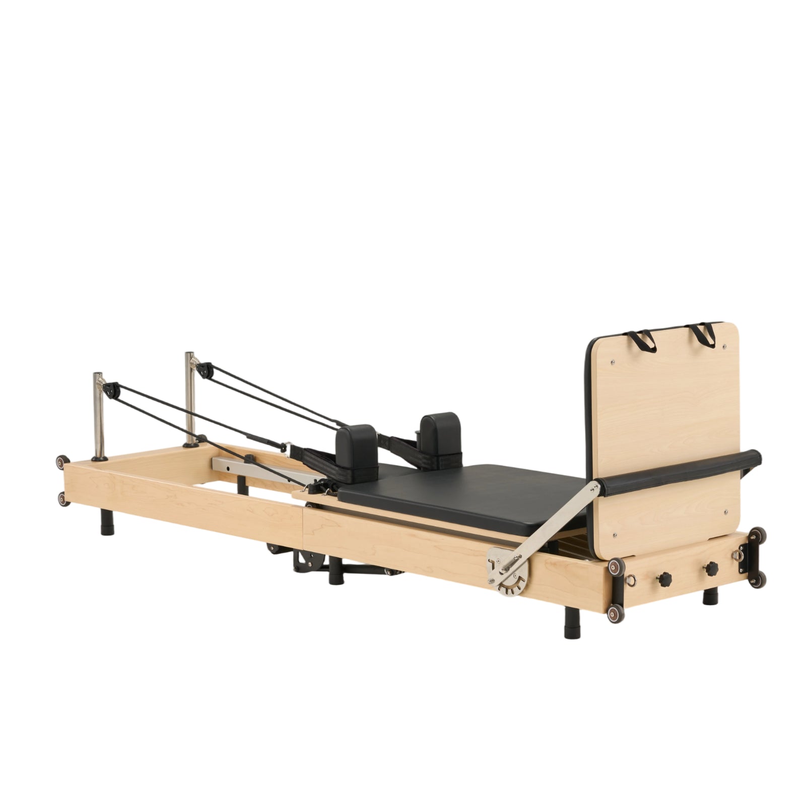 Sleek side profile of Nestor maple wood reformer, highlighting the light natural wood grain and foldable frame.