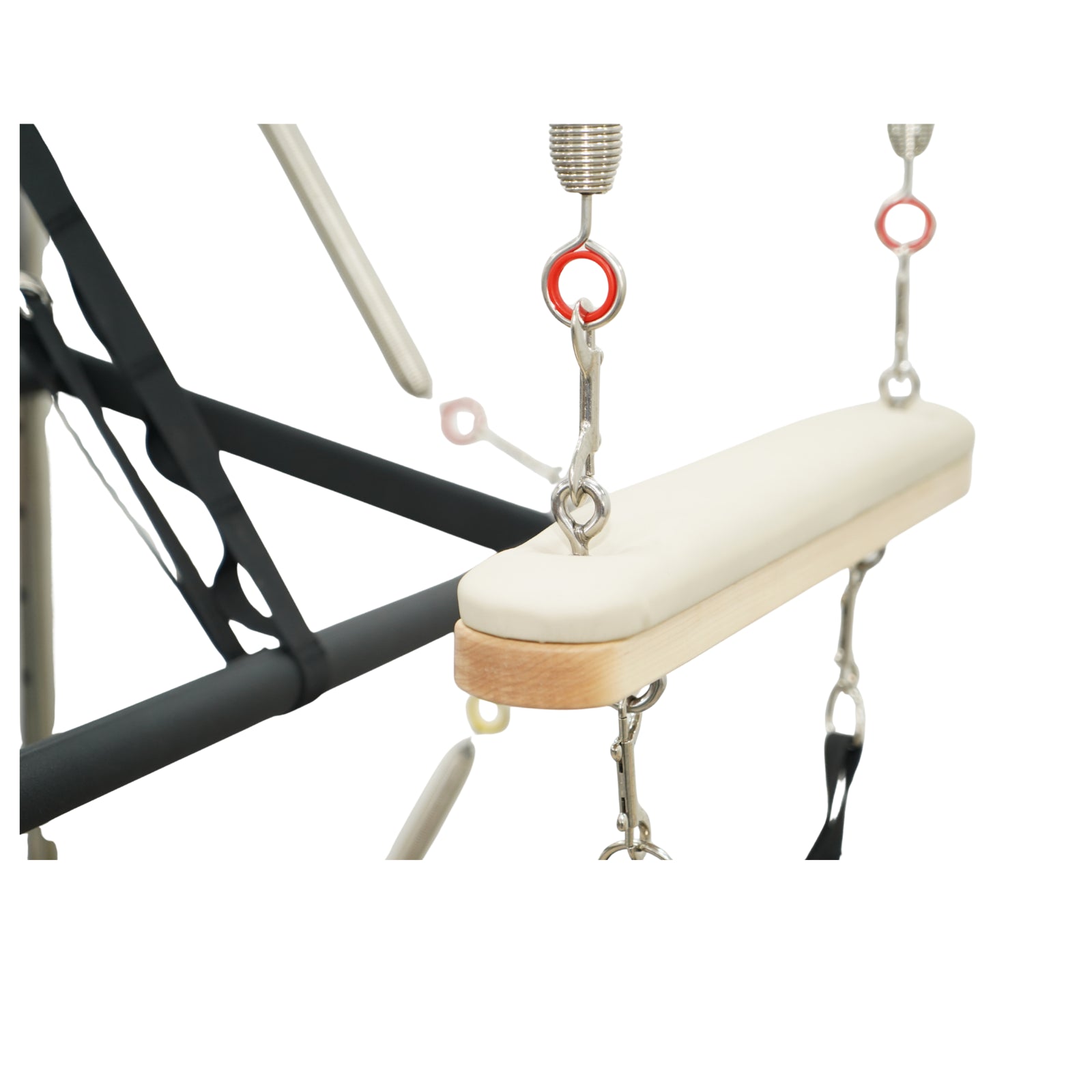Padded trapeze bar with dual-spring support on the Timber Pro cadillac for advanced aerial pilates.