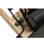 High-quality rope cleats and cord adjustment system on the Nestor maple reformer, professional grade hardware.