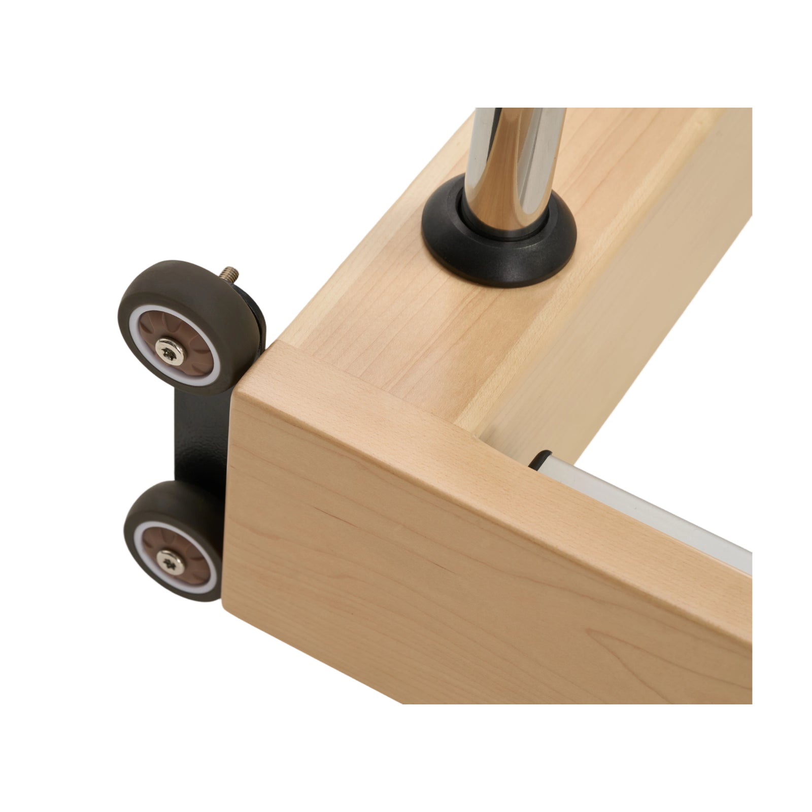 Durable transport wheels on Nestor wooden reformer base for easy mobility and safe floor protection.